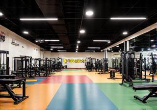 Wide view of the main gym floor area at PrimaFit Malaysia