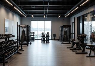 Interior view of PrimaFit Malaysia gym showing strength equipment section
